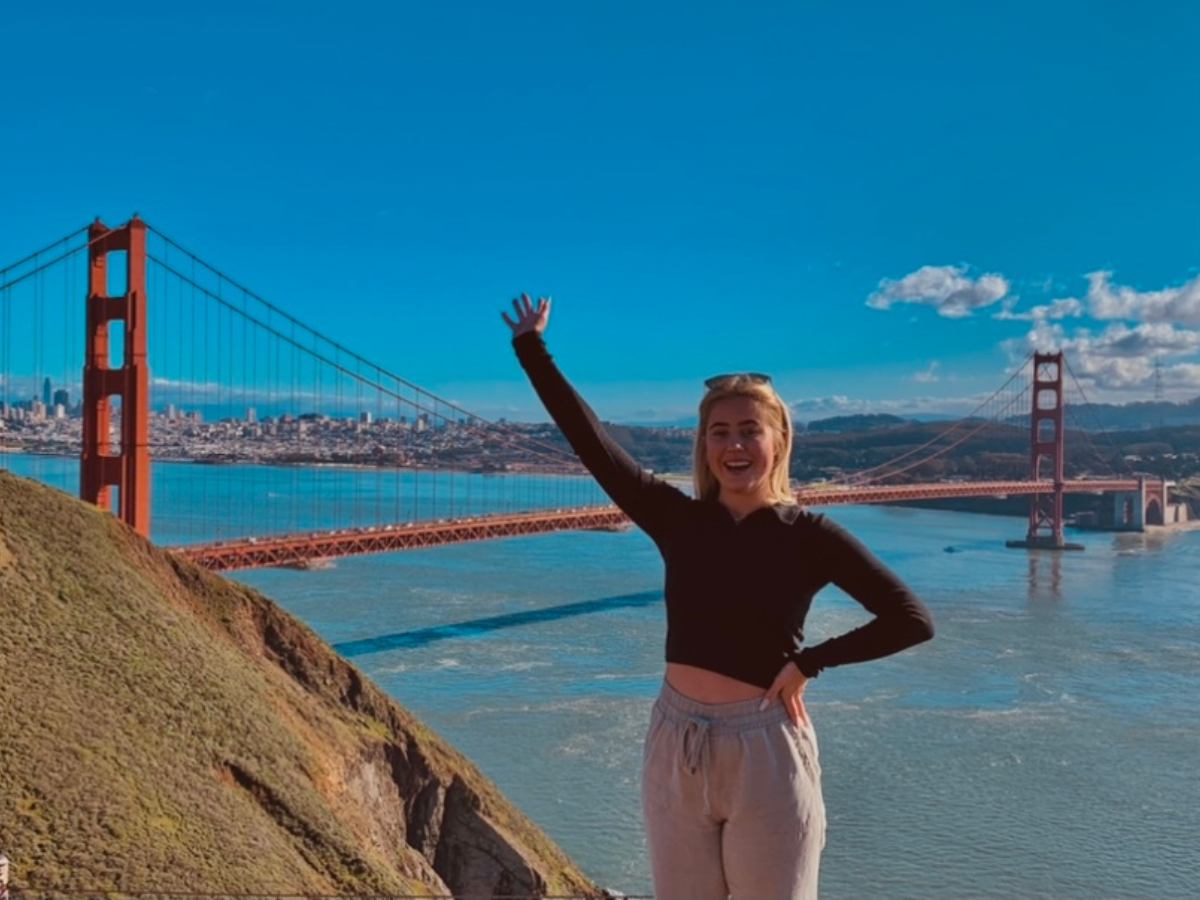 Queen's student at Golden Gate bridge