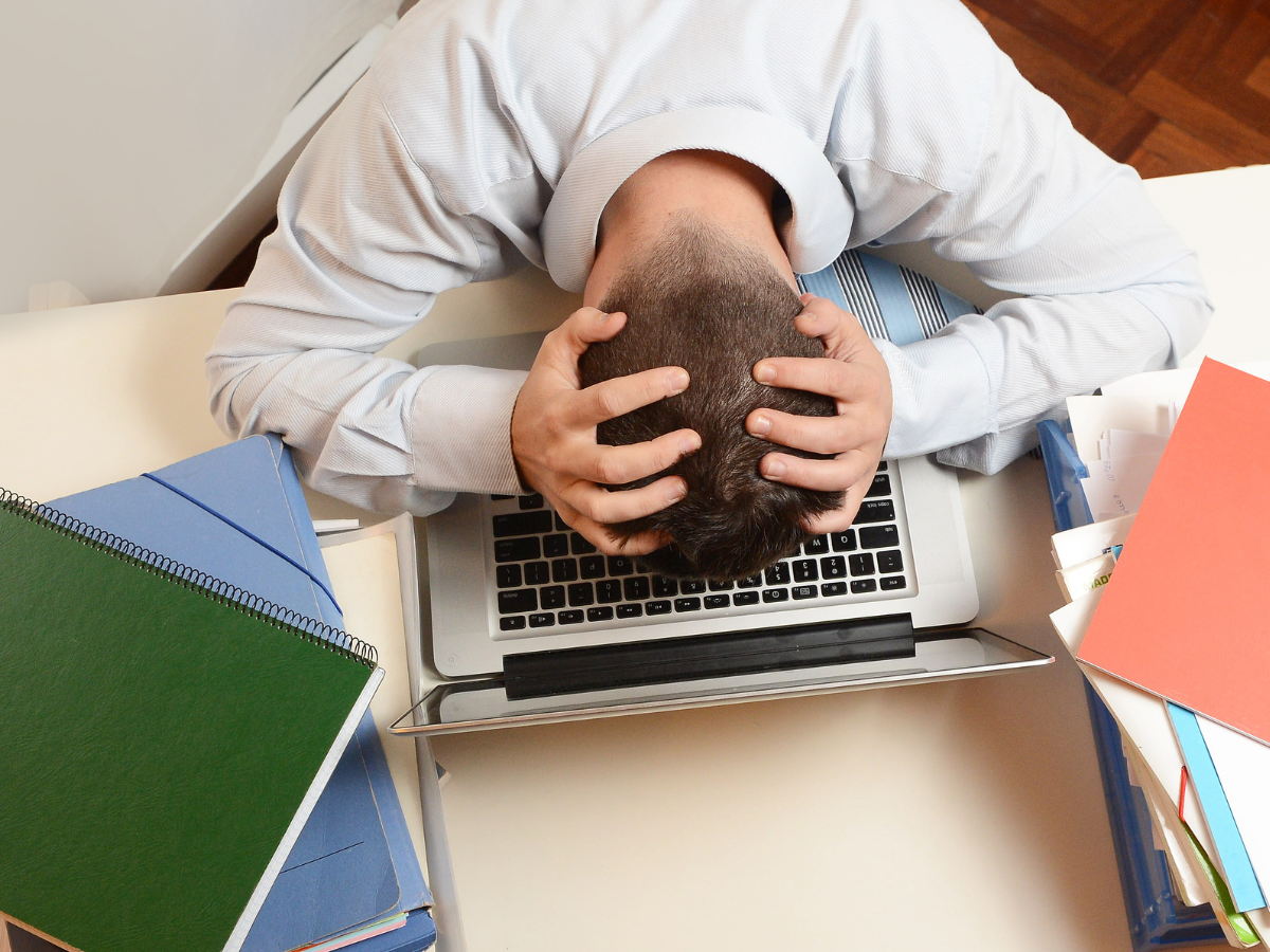 stressed out student at computer