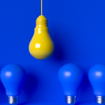 Series of blue bulbs with a yellow bulb above