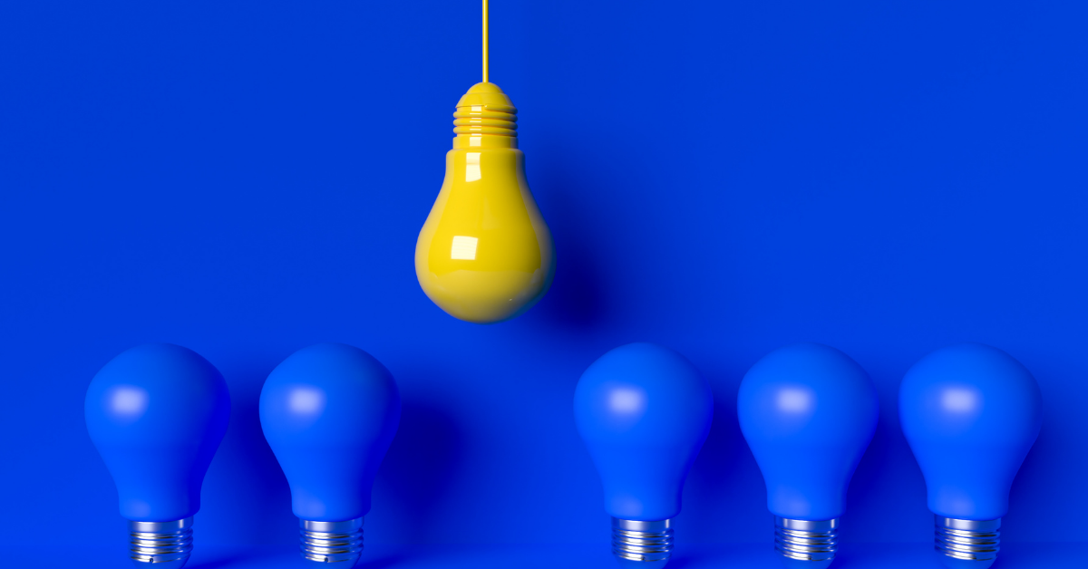 Series of blue bulbs with a yellow bulb above