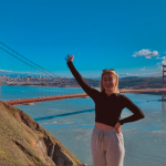Queen's student at Golden Gate bridge
