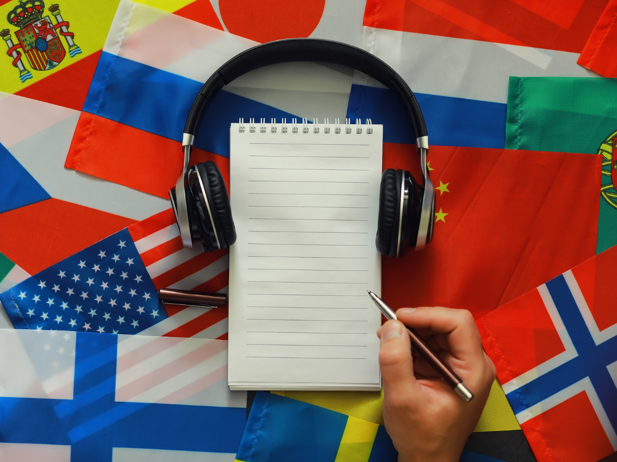Notepad on a collage of countries flags
