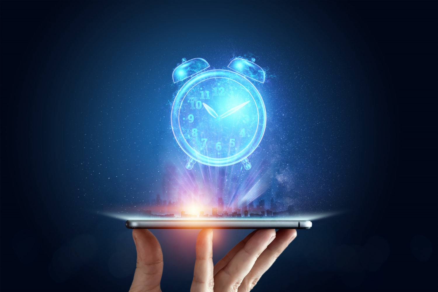 Hand holding a tablet with a projection of a clock coming from it