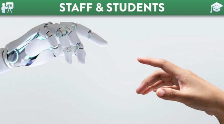 Robot hand and human hand reaching out towards each other