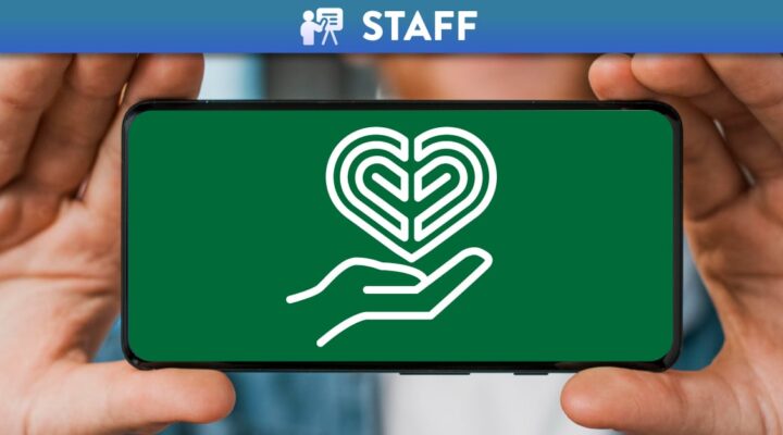 Person holding phone sideways with the Jisc icon for Digital Identity and Wellbeing