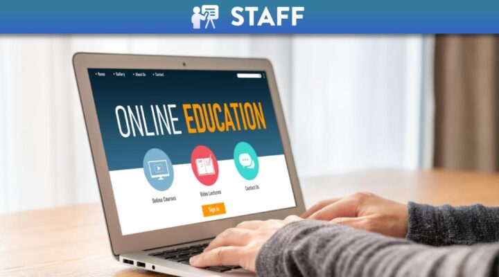 Laptop screen with text 'Online Education'