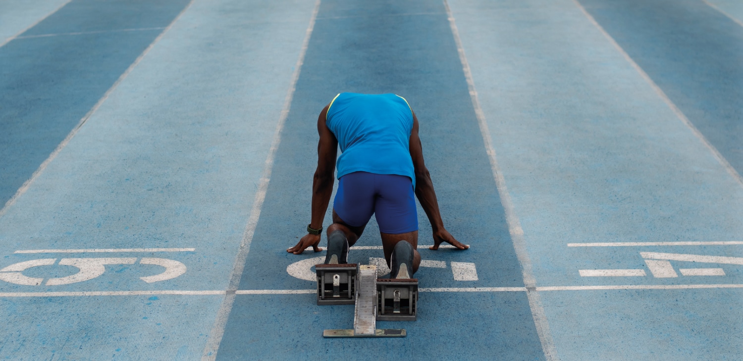 Male athlete a the starting line of a race