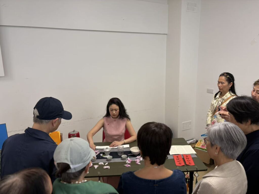 Wei Deng demoed tea making technique