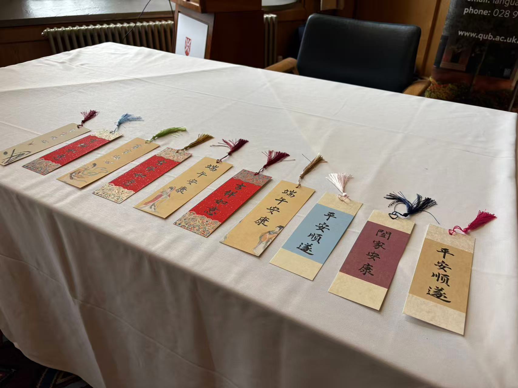 Calligraphy bookmarks carrying festival greeting messages.