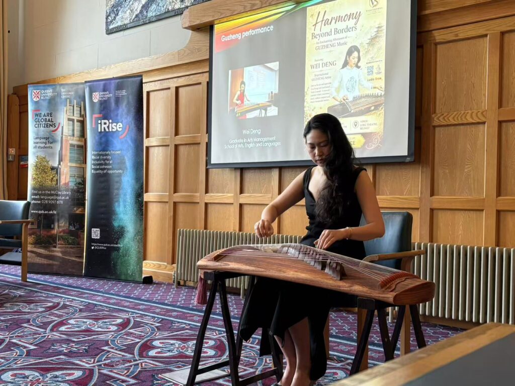 Wei Deng performed guzheng music at the event.