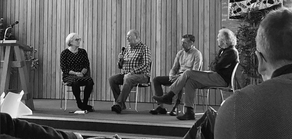 Panellists answering audience questions on stage