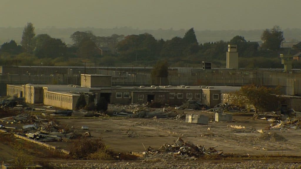 A picture of H-Block demolished with the watch tower above.