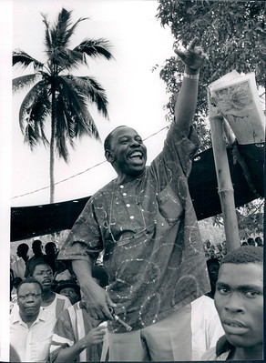 Ken Saro-Wiwa with his hand in the air