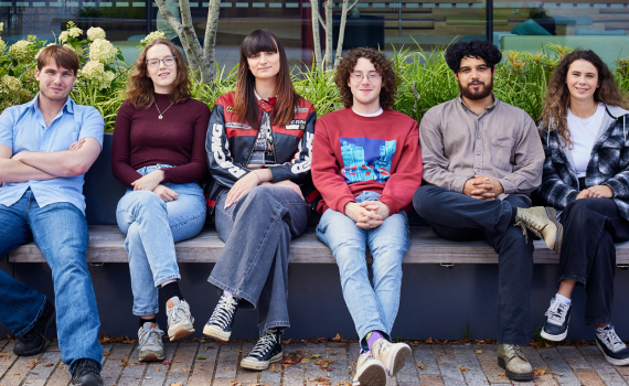 Image of the Student Officers sitting outside the Students' Union