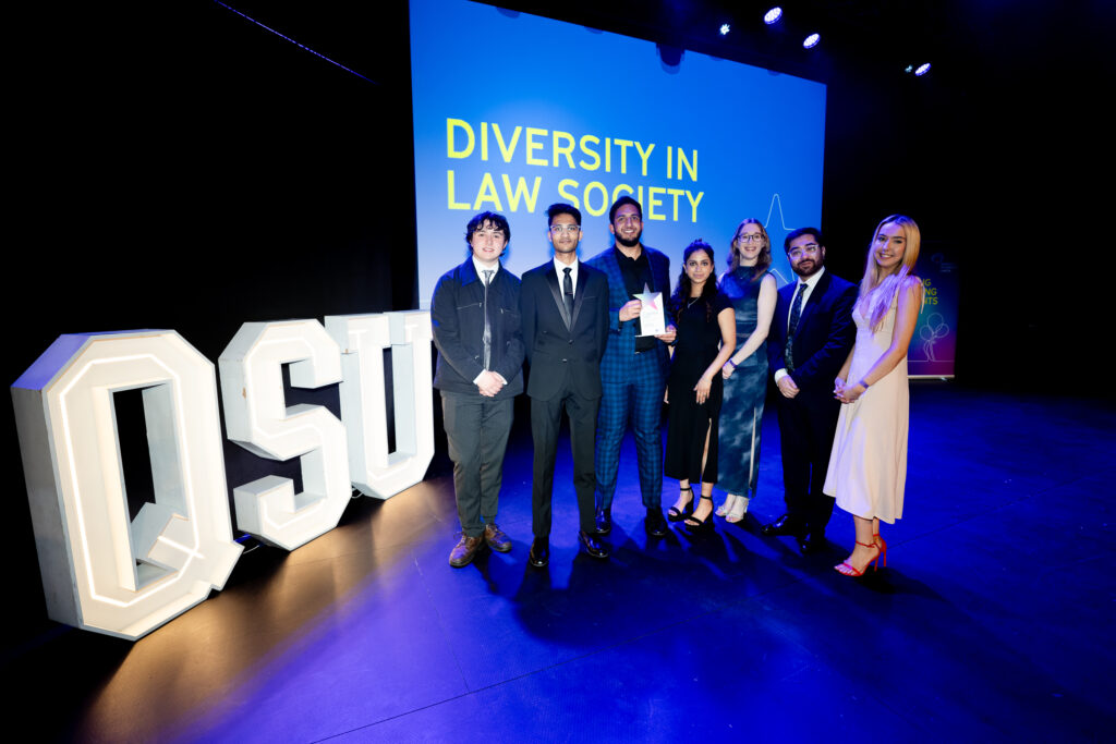 Diversity in Law Society on stage winning their award
