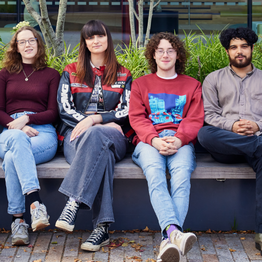 Image of the Student Officers sitting outside the Students' Union