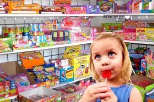 Kid in sweet shop